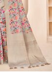 Beige Organza Floral Printed Saree with Zari Border, Decorative Tassels and Butta Work