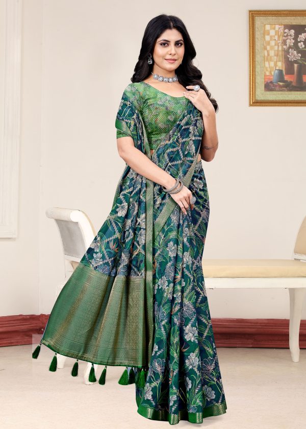 Bottle Green Organza Saree Showcasing Lush Floral Designs, Ornate Zari Border, and Intricate Zari Embellishments