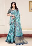 Breezy Sky Blue Organza Saree with Artistic Floral Designs, Lustrous Zari Border, and Subtle Butta