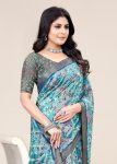 Breezy Sky Blue Organza Saree with Artistic Floral Designs, Lustrous Zari Border, and Subtle Butta