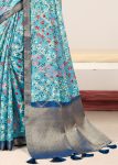 Breezy Sky Blue Organza Saree with Artistic Floral Designs, Lustrous Zari Border, and Subtle Butta