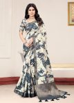 Cream Organza Saree with Soft Abstract Designs, Zari Embellished Border and Scattered Butta Work