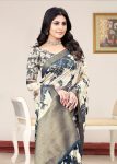 Cream Organza Saree with Soft Abstract Designs, Zari Embellished Border and Scattered Butta Work