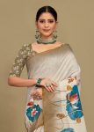 Elegant Cream Linen Silk Saree with Floral Design, Zari Border, and Tassel Detailing