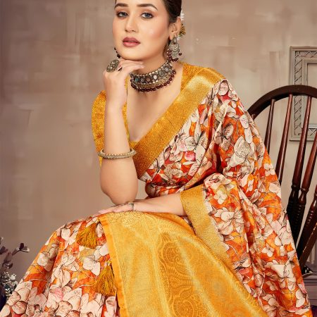 Graceful Orange-Yellow Saree with Bold Floral Prints, Luxurious Zari Borders and Butta Work