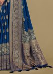 Lustrous Blue Satin Silk Saree with Bold Ikat Motifs and Refined Zari Woven Border Accents