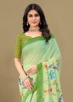 Pista Soft Linen Silk Saree Featuring All-Over Floral Motifs and Zari Border