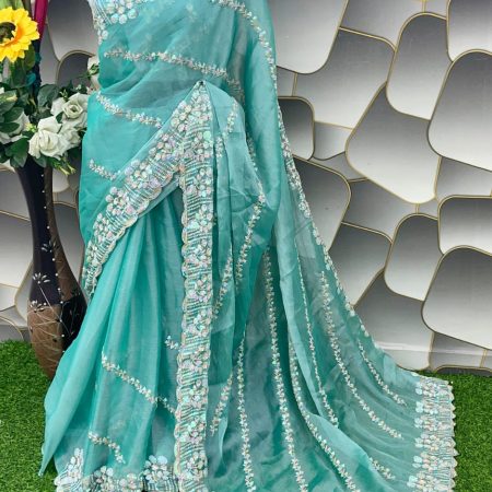 Amazing Turquoise Jimmy Choo Silk Saree With Innovative Blouse Piece