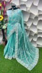 Amazing Turquoise Jimmy Choo Silk Saree With Innovative Blouse Piece