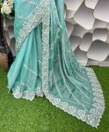 Amazing Turquoise Jimmy Choo Silk Saree With Innovative Blouse Piece