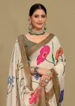 Soft Linen Silk Saree in Beige with Floral Prints, Zari Woven Border, and Tassels